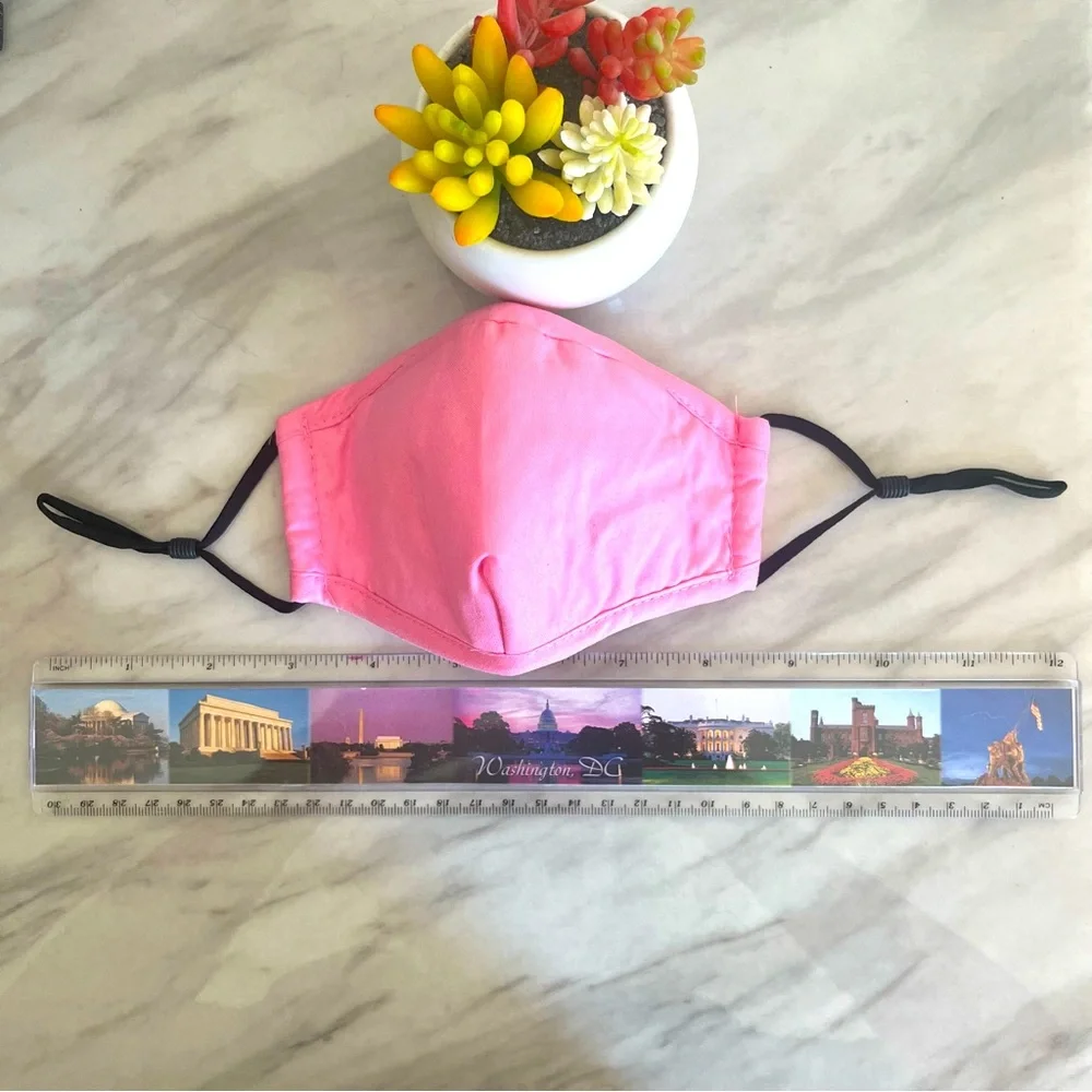 Pink face mask with filter pocket and adjustable ear loops